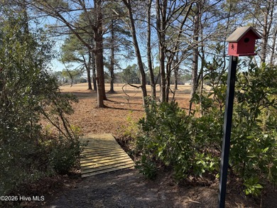 This beautiful brick home is ideally positioned on Fairfield on Harbour Point Golf Club in North Carolina - for sale on GolfHomes.com, golf home, golf lot