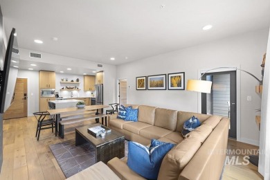 Discover luxury living in this exquisite 2-bedroom, 2-bathroom on Osprey Meadows at Tamarack Resort in Idaho - for sale on GolfHomes.com, golf home, golf lot