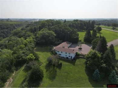 Welcome to this timeless midcentury home, overlooking the on Shoreland Golf and Tennis Club in Minnesota - for sale on GolfHomes.com, golf home, golf lot