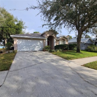 ABSOLUTELY STUNNING HOME IN AN AMAZING NEIGHBORHOOD.  2/2/2 BUT on Meadow Oaks Golf and Country Club in Florida - for sale on GolfHomes.com, golf home, golf lot