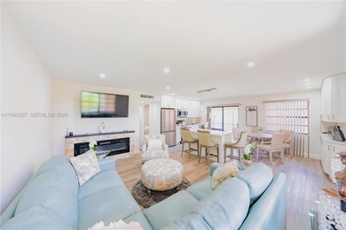 Leave the snow behind and enjoy the sunshine in this beautifully on Kings Point Golf -Flanders Way in Florida - for sale on GolfHomes.com, golf home, golf lot