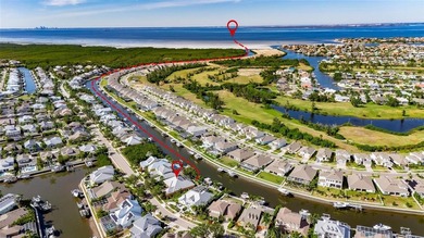 539 Islebay Drive | 4 Bedrooms | 3 Baths | Pool | Waterfront | on Apollo Beach Golf and Sea Club in Florida - for sale on GolfHomes.com, golf home, golf lot