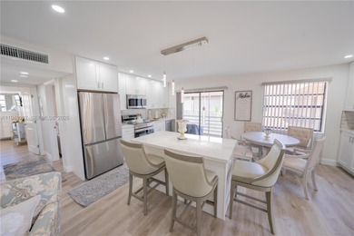 Leave the snow behind and enjoy the sunshine in this beautifully on Kings Point Golf -Flanders Way in Florida - for sale on GolfHomes.com, golf home, golf lot