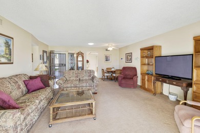 Experience resort-style living in this furnished golf course on Fountain of the Sun Country Club in Arizona - for sale on GolfHomes.com, golf home, golf lot