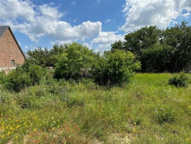 Lot 1018 on Lake Breeze Dr. in Kings Point Cove Unit 3 is a .26 on Hideout Golf Club and Resort  in Texas - for sale on GolfHomes.com, golf home, golf lot