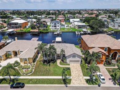 Beautiful canal home located in Golf and Sea Village in Apollo on Apollo Beach Golf and Sea Club in Florida - for sale on GolfHomes.com, golf home, golf lot