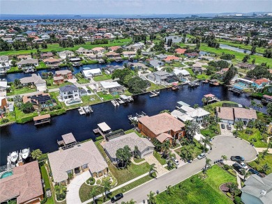 Beautiful canal home located in Golf and Sea Village in Apollo on Apollo Beach Golf and Sea Club in Florida - for sale on GolfHomes.com, golf home, golf lot