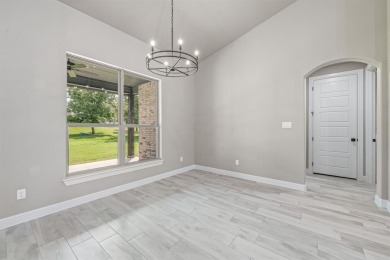 New construction 4 bedroom full 3 bath 2 car garage with a golf on Pecan Plantation Country Club in Texas - for sale on GolfHomes.com, golf home, golf lot