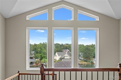 Stunning Waterfront Atrium Ranch with 4 bedrooms, 3 full baths on Raintree Country Club in Missouri - for sale on GolfHomes.com, golf home, golf lot