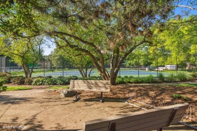 This beautifully updated two bedroom plus loft retreat lives on Lake Barrington Shores Golf Course in Illinois - for sale on GolfHomes.com, golf home, golf lot