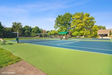 This beautifully updated two bedroom plus loft retreat lives on Lake Barrington Shores Golf Course in Illinois - for sale on GolfHomes.com, golf home, golf lot