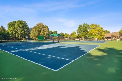 This beautifully updated two bedroom plus loft retreat lives on Lake Barrington Shores Golf Course in Illinois - for sale on GolfHomes.com, golf home, golf lot