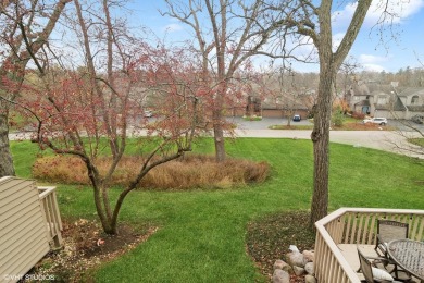 This beautifully updated two bedroom plus loft retreat lives on Lake Barrington Shores Golf Course in Illinois - for sale on GolfHomes.com, golf home, golf lot