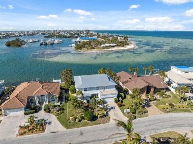 Exquisite Waterfront Luxury Home with Breathtaking Gulf Views on Key Royale Club in Florida - for sale on GolfHomes.com, golf home, golf lot