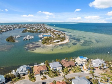 Exquisite Waterfront Luxury Home with Breathtaking Gulf Views on Key Royale Club in Florida - for sale on GolfHomes.com, golf home, golf lot