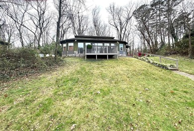 Enjoy the serenity of the Little Red River in this masterfully on Lost Creek Golf Club in Arkansas - for sale on GolfHomes.com, golf home, golf lot
