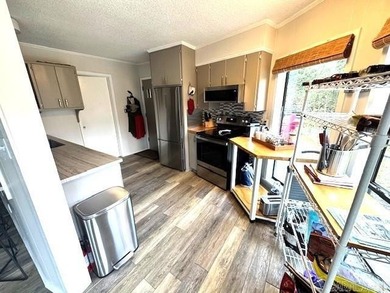 Enjoy the serenity of the Little Red River in this masterfully on Lost Creek Golf Club in Arkansas - for sale on GolfHomes.com, golf home, golf lot