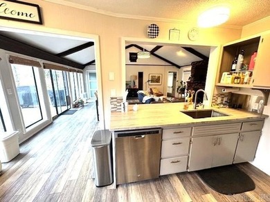 Enjoy the serenity of the Little Red River in this masterfully on Lost Creek Golf Club in Arkansas - for sale on GolfHomes.com, golf home, golf lot