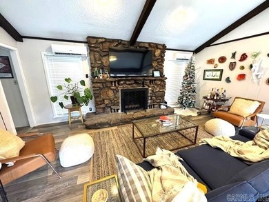 Enjoy the serenity of the Little Red River in this masterfully on Lost Creek Golf Club in Arkansas - for sale on GolfHomes.com, golf home, golf lot