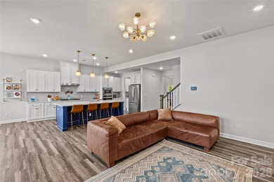 This stunning 4BR/3BA home in The Meridians offers an open floor on The Palisades Country Club in North Carolina - for sale on GolfHomes.com, golf home, golf lot