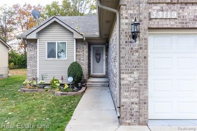 Enjoy the convenience of single level living in this beautiful on St. Clair Shores Country Club in Michigan - for sale on GolfHomes.com, golf home, golf lot
