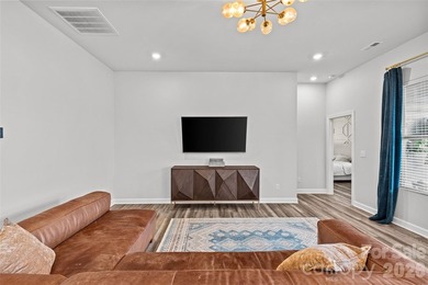 This stunning 4BR/3BA home in The Meridians offers an open floor on The Palisades Country Club in North Carolina - for sale on GolfHomes.com, golf home, golf lot