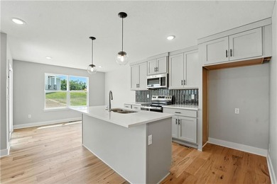 Experience the *Lily*, where modern elegance meets effortless on Golf Club of Creekmoor in Missouri - for sale on GolfHomes.com, golf home, golf lot