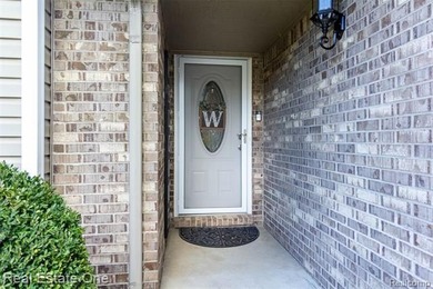Enjoy the convenience of single level living in this beautiful on St. Clair Shores Country Club in Michigan - for sale on GolfHomes.com, golf home, golf lot