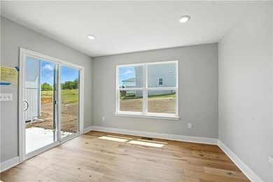 Experience the *Lily*, where modern elegance meets effortless on Golf Club of Creekmoor in Missouri - for sale on GolfHomes.com, golf home, golf lot