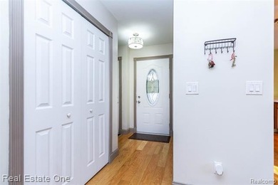 Enjoy the convenience of single level living in this beautiful on St. Clair Shores Country Club in Michigan - for sale on GolfHomes.com, golf home, golf lot