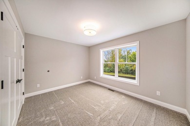 **Seller offering a concession at closing toward closing costs on Grande Golf Club in Michigan - for sale on GolfHomes.com, golf home, golf lot