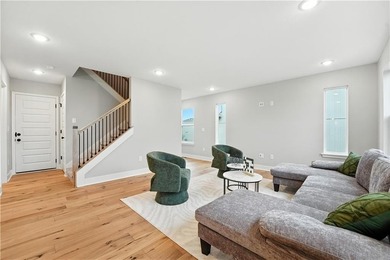 Experience the *Lily*, where modern elegance meets effortless on Golf Club of Creekmoor in Missouri - for sale on GolfHomes.com, golf home, golf lot