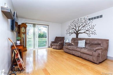 Enjoy the convenience of single level living in this beautiful on St. Clair Shores Country Club in Michigan - for sale on GolfHomes.com, golf home, golf lot