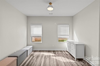 This stunning 4BR/3BA home in The Meridians offers an open floor on The Palisades Country Club in North Carolina - for sale on GolfHomes.com, golf home, golf lot