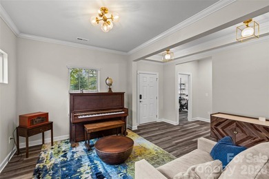 This stunning 4BR/3BA home in The Meridians offers an open floor on The Palisades Country Club in North Carolina - for sale on GolfHomes.com, golf home, golf lot