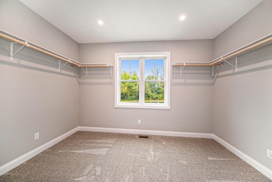 **Seller offering a concession at closing toward closing costs on Grande Golf Club in Michigan - for sale on GolfHomes.com, golf home, golf lot