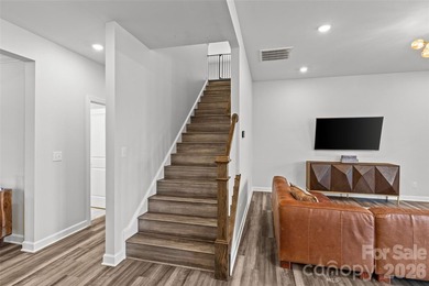 This stunning 4BR/3BA home in The Meridians offers an open floor on The Palisades Country Club in North Carolina - for sale on GolfHomes.com, golf home, golf lot