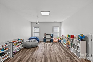 This stunning 4BR/3BA home in The Meridians offers an open floor on The Palisades Country Club in North Carolina - for sale on GolfHomes.com, golf home, golf lot