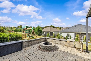 This stunning 4BR/3BA home in The Meridians offers an open floor on The Palisades Country Club in North Carolina - for sale on GolfHomes.com, golf home, golf lot