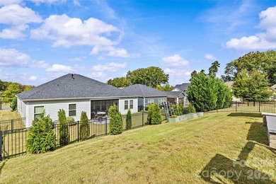 This stunning 4BR/3BA home in The Meridians offers an open floor on The Palisades Country Club in North Carolina - for sale on GolfHomes.com, golf home, golf lot