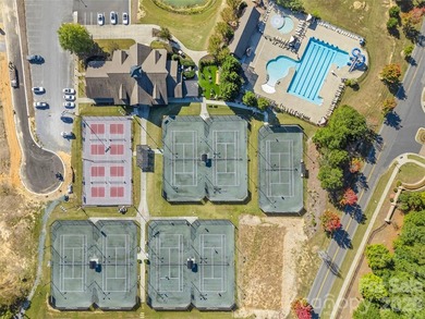 This stunning 4BR/3BA home in The Meridians offers an open floor on The Palisades Country Club in North Carolina - for sale on GolfHomes.com, golf home, golf lot