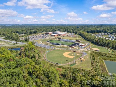 This stunning 4BR/3BA home in The Meridians offers an open floor on The Palisades Country Club in North Carolina - for sale on GolfHomes.com, golf home, golf lot