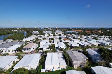 Welcome to the ''Surf Shack'' in Jupiter River Park where you on Jupiter Dunes Golf Course in Florida - for sale on GolfHomes.com, golf home, golf lot