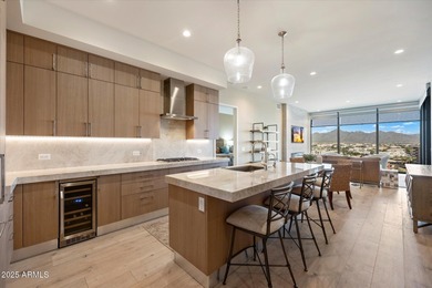 Step inside this beautiful 10th-floor penthouse at Optima on Kierland Golf Club in Arizona - for sale on GolfHomes.com, golf home, golf lot