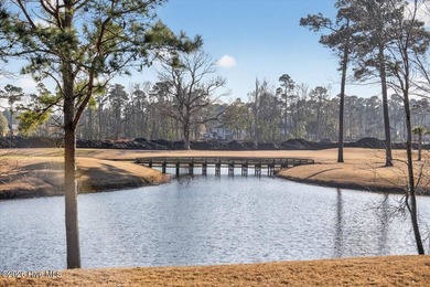 Step inside this luxury modern coastal craftsman home, perfectly on Sea Trail Golf Resort in North Carolina - for sale on GolfHomes.com, golf home, golf lot