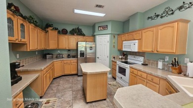 This 2100 SF home is located on a very quiet cul-de-sac in on The Riverside Golf Club in Florida - for sale on GolfHomes.com, golf home, golf lot