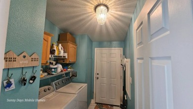 This 2100 SF home is located on a very quiet cul-de-sac in on The Riverside Golf Club in Florida - for sale on GolfHomes.com, golf home, golf lot