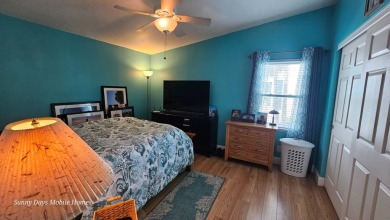 This 2100 SF home is located on a very quiet cul-de-sac in on The Riverside Golf Club in Florida - for sale on GolfHomes.com, golf home, golf lot