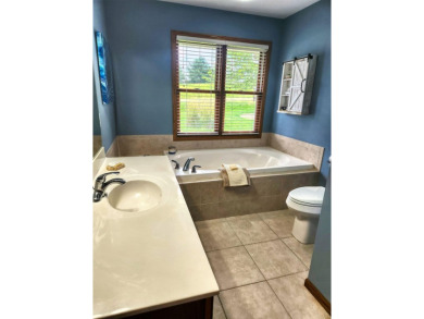 Welcome to this beautiful ranch home set on a generous .78 acre on Lake Carroll Golf Course in Illinois - for sale on GolfHomes.com, golf home, golf lot