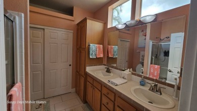 This 2100 SF home is located on a very quiet cul-de-sac in on The Riverside Golf Club in Florida - for sale on GolfHomes.com, golf home, golf lot